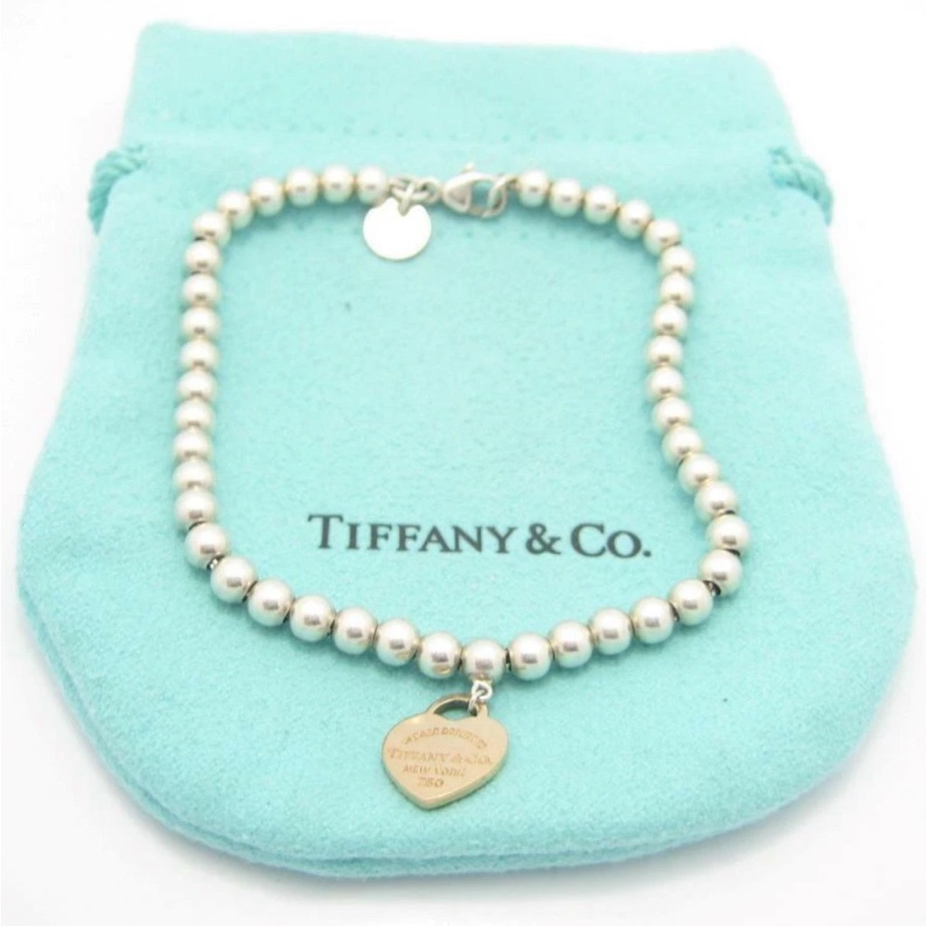 Tiffany & Co. Silver Bead Bracelet With Gold Heart Charm